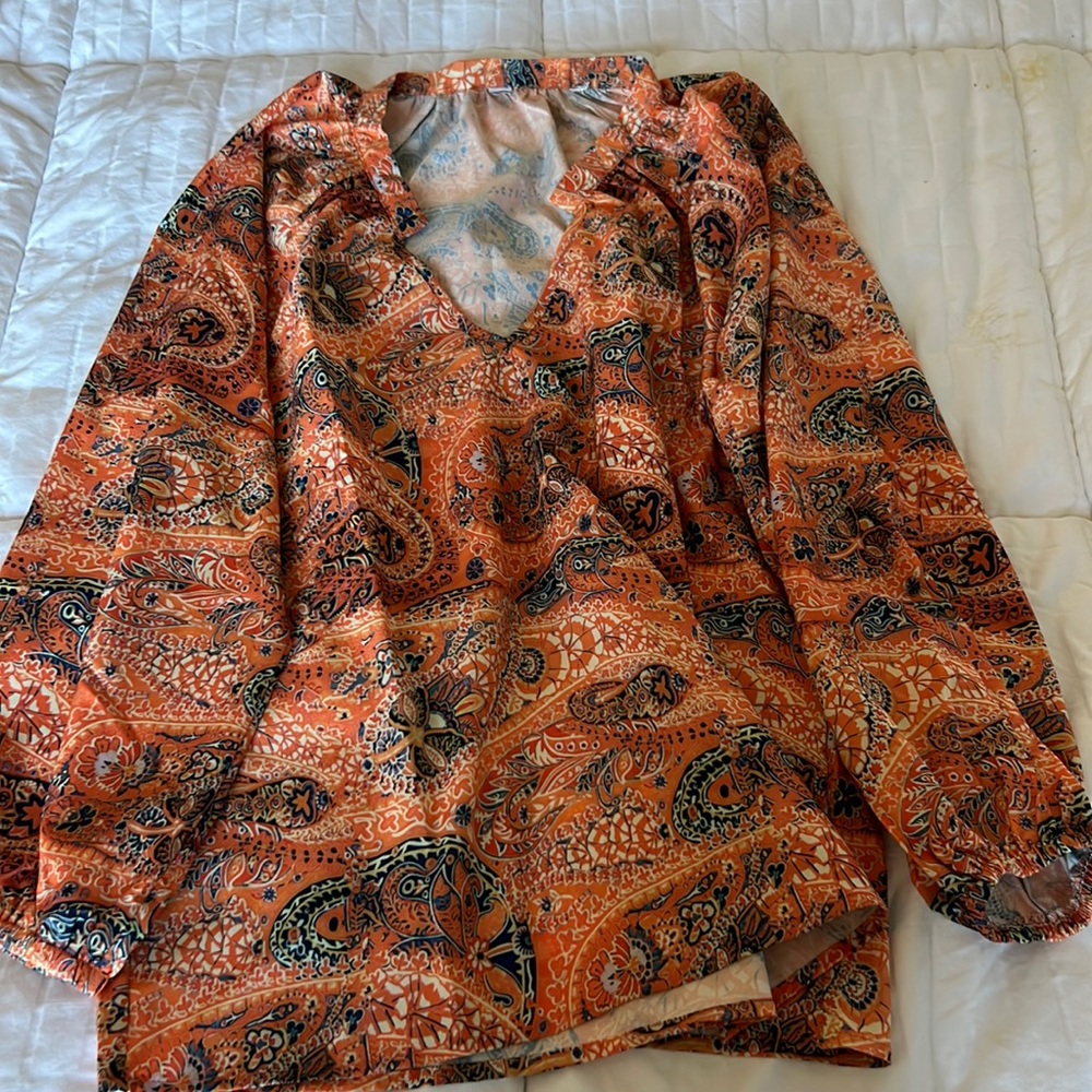 Orange blouse.